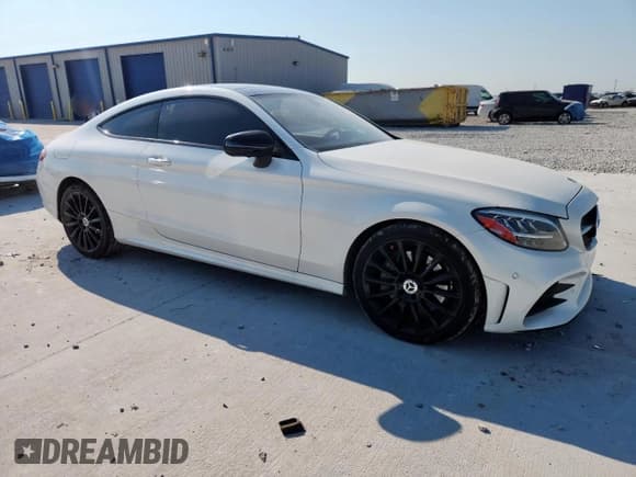 ✅ 2020 Mercedes-Benz C 300 • VIN: W1KWJ8DBXLF989854 • Lot: 81077045. Listed on Copart with 74,838 mi. Free auction sales archive from the USA and detailed vehicle history report at DreamBid. Image 4.
