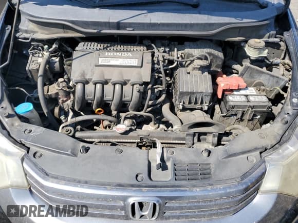 ✅ 2010 Honda Insight EX • VIN: JHMZE2H78AS015498 • Лот: 71292474. Опубликован ранее на Copart с пробегом 233 287 миль. Бесплатный доступ к архиву аукционных продаж из США и подробный отчёт об истории автомобиля на DreamBid. Изображение 11.