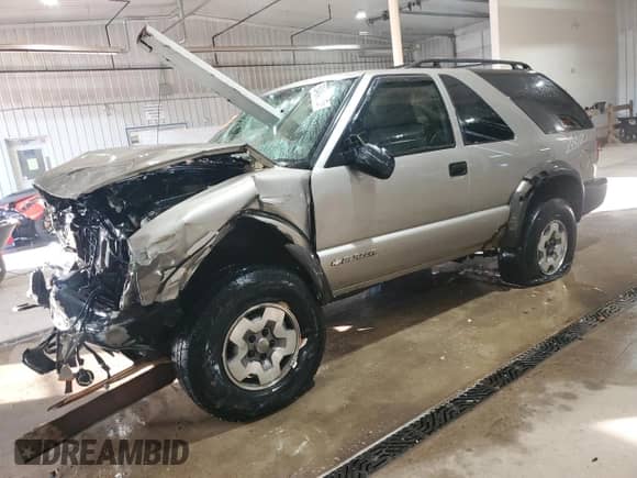 2004 Chevrolet Blazer LS с VIN 1GNCT18X34K143280, выставлен на аукционе Copart как лот 50494785 с пробегом Не указан миль и Списание • Salvage title. История ставок и продаж доступна на DreamBid. Изображение 1.