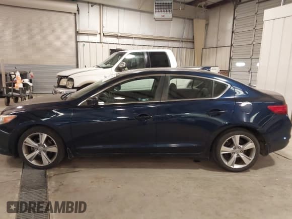 ✅ 2013 Acura ILX Premium • VIN: 19VDE1F57DE005746 • Lot: 41269770. Listed on IAAI with 128,624 mi. Free auction sales archive from the USA and detailed vehicle history report at DreamBid. Image 15.