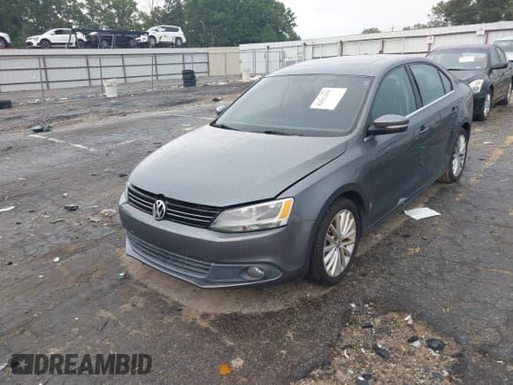 ✅ 2014 Volkswagen Jetta TDI • VIN: 3VWLL7AJ7EM383358 • Lot: 42902184. Listed on IAAI with 89,927 mi. Free auction sales archive from the USA and detailed vehicle history report at DreamBid. Image 2.