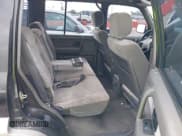 ✅ 1999 Isuzu Trooper S • VIN: JACDJ58X5X7902821 • Lot: 40762329. Wystawiony na IAAI z przebiegiem 182 773 mil. Bezpłatny archiwum sprzedaży aukcyjnych z USA i szczegółowy raport historii pojazdu na DreamBid. Zdjęcie 8.