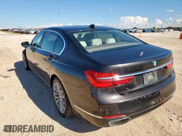 ✅ 2016 BMW 7 Series 740i • VIN: WBA7E2C53GG738618 • Лот: 82054445. Опубликован ранее на Copart с пробегом 95 444 миль. Бесплатный доступ к архиву аукционных продаж из США и подробный отчёт об истории автомобиля на DreamBid. Изображение 2.
