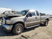 ✅ 2002 Ford F-250 XL • VIN: 1FTNX20F12EA19230 • Lot: 74044634. Listed on Copart with 392,488 mi. Free auction sales archive from the USA and detailed vehicle history report at DreamBid. Image 1.