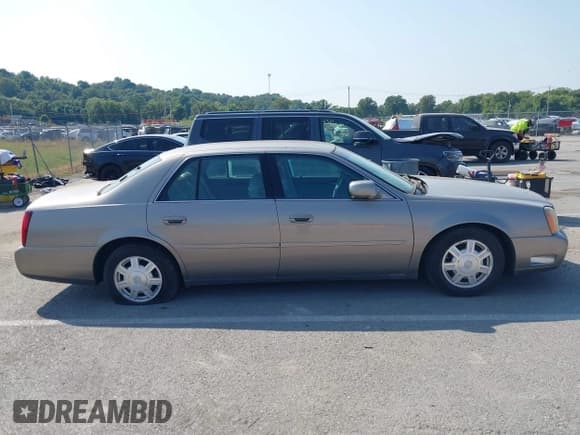 ✅ 2003 Cadillac DeVille • VIN: 1G6KD54Y43U151482 • Lot: 43140962. Wystawiony na IAAI z przebiegiem 101 641 mil. Bezpłatny archiwum sprzedaży aukcyjnych z USA i szczegółowy raport historii pojazdu na DreamBid. Zdjęcie 13.