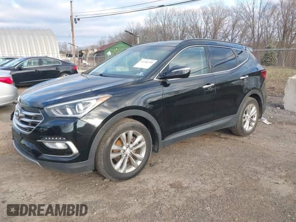 2017 Hyundai Santa Fe 2.0T z VIN 5XYZUDLA8HG502333, wystawiony jako IAAI lot #41246195 z przebiegiem 62 772 mil mil oraz . Historia ofert i sprzedaży dostępna na DreamBid. Obrazek 2.
