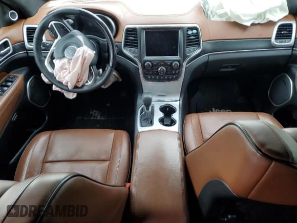 ✅ 2018 Jeep Grand Cherokee Summit • VIN: 1C4RJFJG0JC436902 • Lot: 71702133. Listed on Copart with 69,164 mi. Free auction sales archive from the USA and detailed vehicle history report at DreamBid. Image 8.