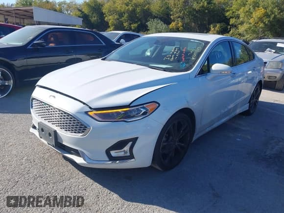 ✅ 2020 Ford Fusion Titanium • VIN: 3FA6P0D90LR173610 • Lot: 43705523. Wystawiony na IAAI z przebiegiem 158 452 mil. Bezpłatny archiwum sprzedaży aukcyjnych z USA i szczegółowy raport historii pojazdu na DreamBid. Zdjęcie 2.