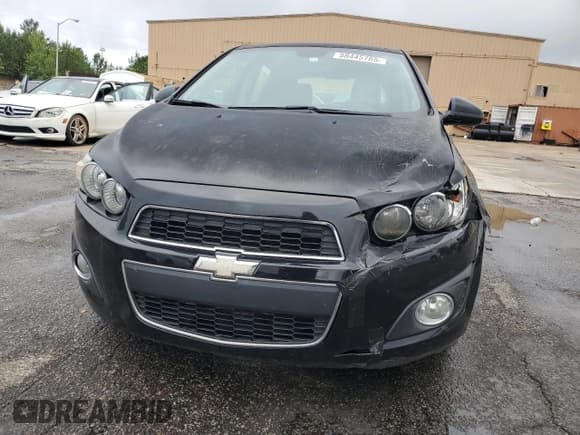 ✅ 2012 Chevrolet Sonic LTZ • VIN: 1G1JE6SH1C4132511 • Lot: 58445765. Listed on Copart with 82,611 mi. Free auction sales archive from the USA and detailed vehicle history report at DreamBid. Image 5.