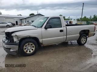 2005 Chevrolet Silverado 1500 Work Truck with VIN 1GCEC14V65Z124298, listed as a Copart auction lot 61008125 with 195,697 mi miles and Salvage title. Bid and sale history available at DreamBid. Image 1.