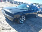 ✅ 2014 Dodge Challenger SXT • VIN: 2C3CDYAG1EH229824 • Lot: 41749410. Listed on IAAI with 103,079 mi. Free auction sales archive from the USA and detailed vehicle history report at DreamBid. Image 18.
