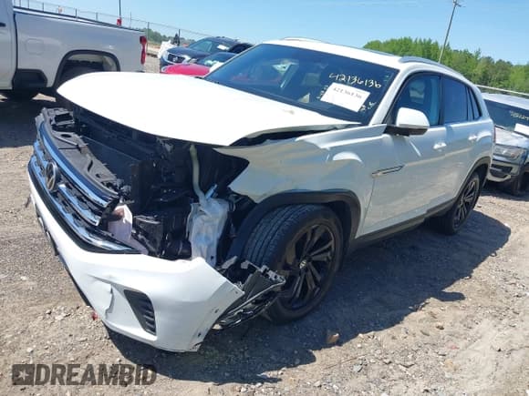 ✅ 2023 Volkswagen Atlas SE • VIN: 1V2KC2CA2PC220778 • Lot: 42136136. Listed on IAAI with 30,370 mi. Free auction sales archive from the USA and detailed vehicle history report at DreamBid. Image 2.