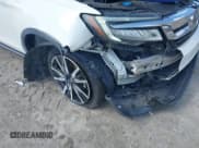 ✅ 2019 Honda Pilot Touring 8-Passenger • VIN: 5FNYF5H9XKB001842 • Lot: 43026784. Listed on IAAI with 114,674 mi. Free auction sales archive from the USA and detailed vehicle history report at DreamBid. Image 6.