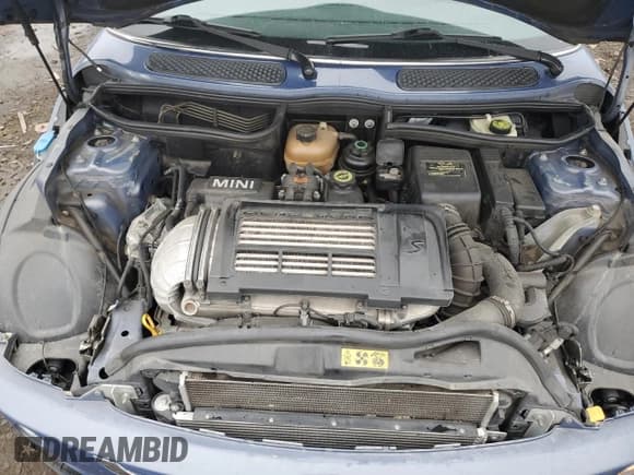 ✅ 2005 MINI Convertible S • VIN: WMWRH33415TK55243 • Lot: 93570225. Wystawiony na Copart z przebiegiem 79 303 mil. Bezpłatny archiwum sprzedaży aukcyjnych z USA i szczegółowy raport historii pojazdu na DreamBid. Zdjęcie 11.