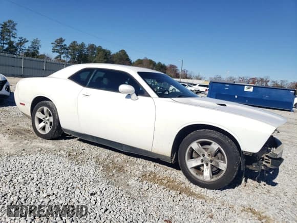 ✅ 2014 Dodge Challenger SXT • VIN: 2C3CDYAG9EH277054 • Lot: 84704754. Wystawiony na Copart z przebiegiem 211 391 mil. Bezpłatny archiwum sprzedaży aukcyjnych z USA i szczegółowy raport historii pojazdu na DreamBid. Zdjęcie 4.