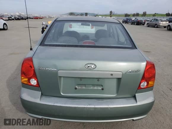 2004 Hyundai Accent GL с VIN KMHCG45C14U540938, выставлен на аукционе Copart как лот 46701935 с пробегом 71 891 миль миль и Списание • Salvage title. История ставок и продаж доступна на DreamBid. Изображение 6.