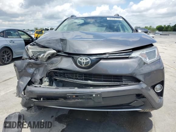 ✅ 2018 Toyota RAV4 XLE • VIN: 2T3RFREVXJW734950 • Lot: 58436135. Wystawiony na Copart z przebiegiem 98 518 mil. Bezpłatny archiwum sprzedaży aukcyjnych z USA i szczegółowy raport historii pojazdu na DreamBid. Zdjęcie 5.