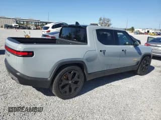 ✅ 2023 Rivian R1T Adventure • VIN: 7FCTGAAA1PN023249 • Lot: 79065654. Listed on Copart with 5,282 mi. Free auction sales archive from the USA and detailed vehicle history report at DreamBid. Image 3.