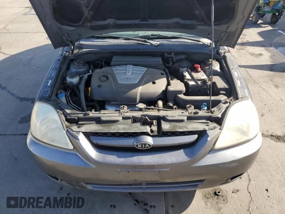 ✅ 2003 Kia Rio • VIN: KNADC165036147905 • Лот: 50461634. Опубликован ранее на Copart с пробегом 86 086 миль. Бесплатный доступ к архиву аукционных продаж из США и подробный отчёт об истории автомобиля на DreamBid. Изображение 11.