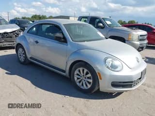 ✅ 2014 Volkswagen Beetle Entry • VIN: 3VWF17AT3EM645882 • Лот: 43372281. Опубликован ранее на IAAI с пробегом 135 797 миль. Бесплатный доступ к архиву аукционных продаж из США и подробный отчёт об истории автомобиля на DreamBid. Изображение 1.