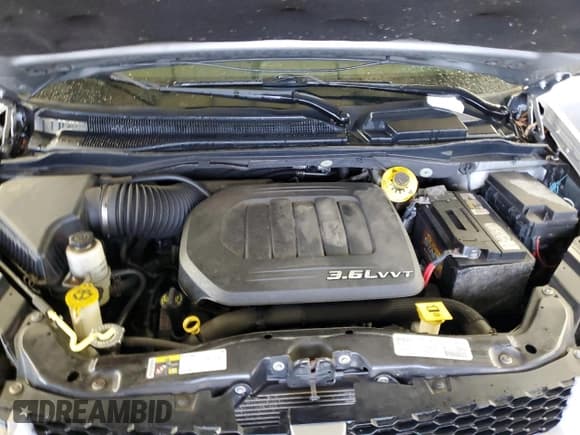 ✅ 2014 Dodge Grand Caravan R/T • VIN: 2C4RDGEG6ER456656 • Lot: 85347665. Listed on Copart with 141,411 mi. Free auction sales archive from the USA and detailed vehicle history report at DreamBid. Image 12.