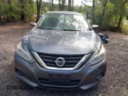 ✅ 2016 Nissan Altima S • VIN: 1N4AL3AP3GN387414 • Lot: 43374576. Listed on IAAI with 216,607 mi. Free auction sales archive from the USA and detailed vehicle history report at DreamBid. Image 12.