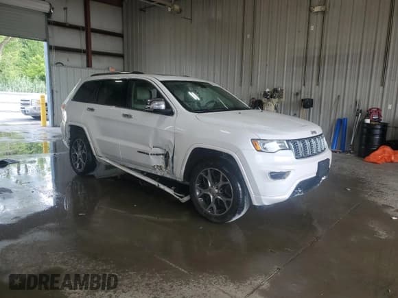 ✅ 2019 Jeep Grand Cherokee Overland • VIN: 1C4RJFCGXKC619805 • Lot: 64515375. Listed on Copart with 94,510 mi. Free auction sales archive from the USA and detailed vehicle history report at DreamBid. Image 4.