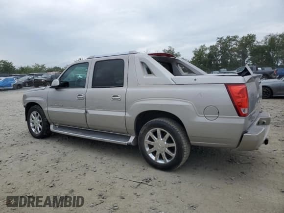 ✅ 2004 Cadillac Escalade EXT • VIN: 3GYEK62N94G205632 • Лот: 80814005. Опубликован ранее на Copart с пробегом 88 689 миль. Бесплатный доступ к архиву аукционных продаж из США и подробный отчёт об истории автомобиля на DreamBid. Изображение 2.