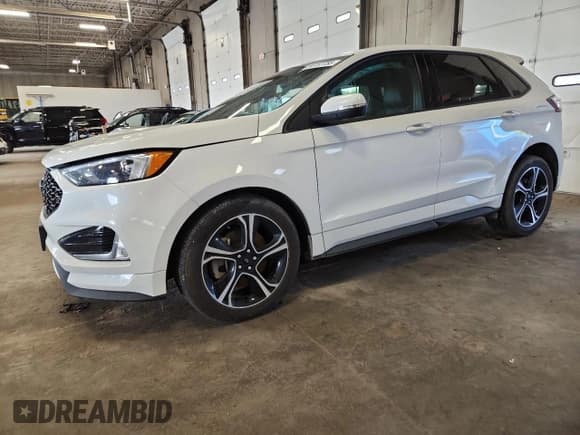 ✅ 2022 Ford Edge ST • VIN: 2FMPK4AP0NBA74497 • Lot: 66157755. Wystawiony na Copart z przebiegiem 28 358 mil. Bezpłatny archiwum sprzedaży aukcyjnych z USA i szczegółowy raport historii pojazdu na DreamBid. Zdjęcie 1.