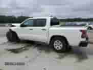 2024 Nissan Frontier SV with VIN 1N6ED1EJ0RN647898, listed as a Copart auction lot 84772235 with 22,240 mi miles and Salvage title. Bid and sale history available at DreamBid. Image 2.