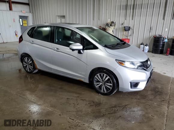 ✅ 2015 Honda Fit EX • VIN: 3HGGK5G86FM744789 • Lot: 57255705. Listed on Copart with 99,156 mi. Free auction sales archive from the USA and detailed vehicle history report at DreamBid. Image 4.