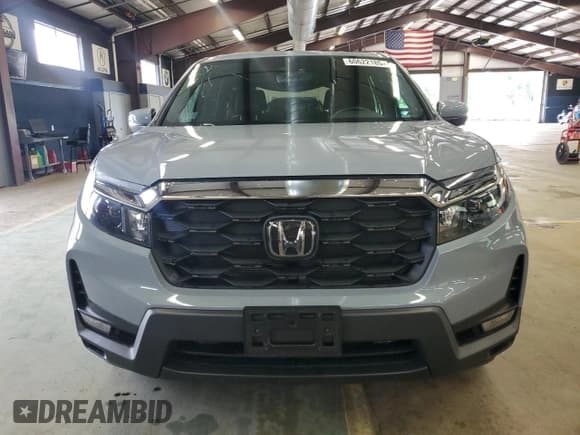 ✅ 2022 Honda Passport EX-L • VIN: 5FNYF8H59NB000975 • Lot: 60622185. Listed on Copart with 40,994 mi. Free auction sales archive from the USA and detailed vehicle history report at DreamBid. Image 5.