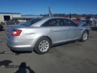 ✅ 2011 Ford Taurus SE • VIN: 1FAHP2DW1BG186284 • Lot: 90042935. Listed on Copart with 152,537 mi. Free auction sales archive from the USA and detailed vehicle history report at DreamBid. Image 3.
