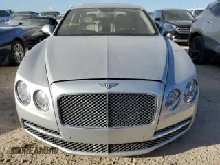 ✅ 2014 Bentley Flying Spur • VIN: SCBEC9ZA1EC093939 • Лот: 75137334. Опубликован ранее на Copart с пробегом Не указан. Бесплатный доступ к архиву аукционных продаж из США и подробный отчёт об истории автомобиля на DreamBid. Изображение 5.