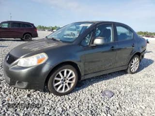 ✅ 2008 Suzuki SX4 Convenience • VIN: JS2YC415485111392 • Lot: 56389895. Listed on Copart with 139,687 mi. Free auction sales archive from the USA and detailed vehicle history report at DreamBid. Image 1.