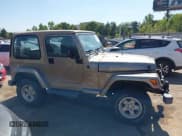 ✅ 2004 Jeep Wrangler Sahara • VIN: 1J4FA59S74P718659 • Lot: 43316154. Listed on IAAI with 144,737 mi. Free auction sales archive from the USA and detailed vehicle history report at DreamBid. Image 13.
