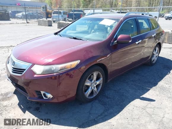 ✅ 2012 Acura TSX • VIN: JH4CW2H51CC002820 • Lot: 42102143. Listed on IAAI with 139,222 mi. Free auction sales archive from the USA and detailed vehicle history report at DreamBid. Image 2.
