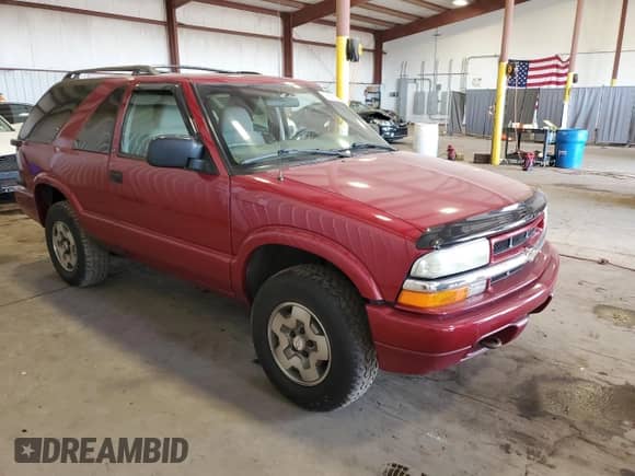 2003 Chevrolet Blazer LS z VIN 1GNCT18X13K165163, wystawiony jako Copart lot #78693034 z przebiegiem 159 770 mil mil oraz Szkoda całkowita • Salvage title. Historia ofert i sprzedaży dostępna na DreamBid. Obrazek 4.