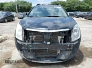 ✅ 2015 Cadillac SRX Premium Collection • VIN: 3GYFNDE39FS622923 • Lot: 59668155. Wystawiony na Copart z przebiegiem 176 206 mil. Bezpłatny archiwum sprzedaży aukcyjnych z USA i szczegółowy raport historii pojazdu na DreamBid. Zdjęcie 5.
