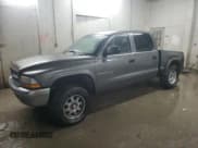 ✅ 2001 Dodge Dakota Sport • VIN: 1B7HG2AN41S334025 • Лот: 89286615. Опубликован ранее на Copart с пробегом 313 917 миль. Бесплатный доступ к архиву аукционных продаж из США и подробный отчёт об истории автомобиля на DreamBid. Изображение 1.