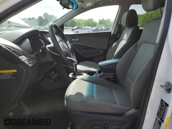 ✅ 2017 Hyundai Santa Fe 2.4L • VIN: 5XYZUDLB7HG388382 • Lot: 57167315. Listed on Copart with 128,724 mi. Free auction sales archive from the USA and detailed vehicle history report at DreamBid. Image 7.