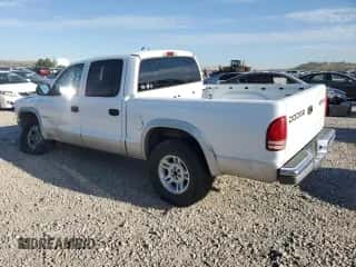 2001 Dodge Dakota Sport z VIN 1B7HG2AN71S260163, wystawiony jako Copart lot #68867304 z przebiegiem 250 426 mil mil oraz Szkoda całkowita • Salvage title. Historia ofert i sprzedaży dostępna na DreamBid. Obrazek 2.