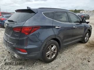 ✅ 2018 Hyundai Santa Fe 2.4L • VIN: 5XYZU3LBXJG513004 • Лот: 49358523. Опубликован ранее на Copart с пробегом 47 891 миль. Бесплатный доступ к архиву аукционных продаж из США и подробный отчёт об истории автомобиля на DreamBid. Изображение 3.