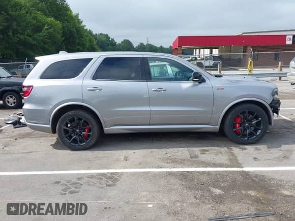 2021 Dodge Durango R/T with VIN 1C4SDJCT6MC879260, listed as a IAAI auction lot 42709837 with 59,646 mi miles and . Bid and sale history available at DreamBid. Image 14.