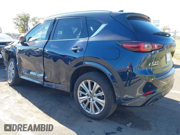 ✅ 2022 Mazda CX-5 Signature • VIN: JM3KFBXY1N0546948 • Lot: 43475970. Wystawiony na IAAI z przebiegiem 41 402 mil. Bezpłatny archiwum sprzedaży aukcyjnych z USA i szczegółowy raport historii pojazdu na DreamBid. Zdjęcie 3.