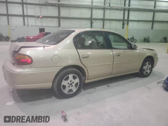 2003 Chevrolet Malibu LS z VIN 1G1NE52J03M675783, wystawiony jako Copart lot #83032764 z przebiegiem 185 343 mil mil oraz Nie do naprawy • Non repairable. Historia ofert i sprzedaży dostępna na DreamBid. Obrazek 3.