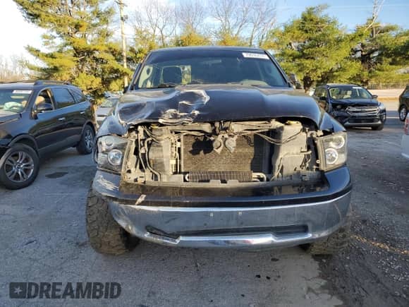 2009 Dodge 1500 SLT z VIN 1D3HV18P99S815754, wystawiony jako Copart lot #79636474 z przebiegiem 172 691 mil mil oraz Szkoda całkowita • Salvage title. Historia ofert i sprzedaży dostępna na DreamBid. Obrazek 5.