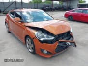 ✅ 2013 Hyundai Veloster Turbo • VIN: KMHTC6AE7DU119420 • Lot: 42676940. Wystawiony na IAAI z przebiegiem 135 948 mil. Bezpłatny archiwum sprzedaży aukcyjnych z USA i szczegółowy raport historii pojazdu na DreamBid. Zdjęcie 1.