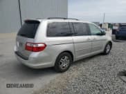 ✅ 2006 Honda Odyssey EX-L • VIN: 5FNRL38656B410666 • Лот: 80554015. Опубликован ранее на Copart с пробегом 243 001 миль. Бесплатный доступ к архиву аукционных продаж из США и подробный отчёт об истории автомобиля на DreamBid. Изображение 3.