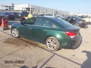 2014 Chevrolet Cruze LTZ z VIN 1G1PG5SB0E7299616, wystawiony jako IAAI lot #42916554 z przebiegiem 137 873 mil mil oraz . Historia ofert i sprzedaży dostępna na DreamBid. Obrazek 3.